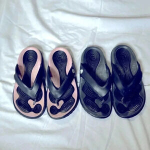 Crocs slip on flips flops / sandals size 6 women’s 2 pairs black and pink